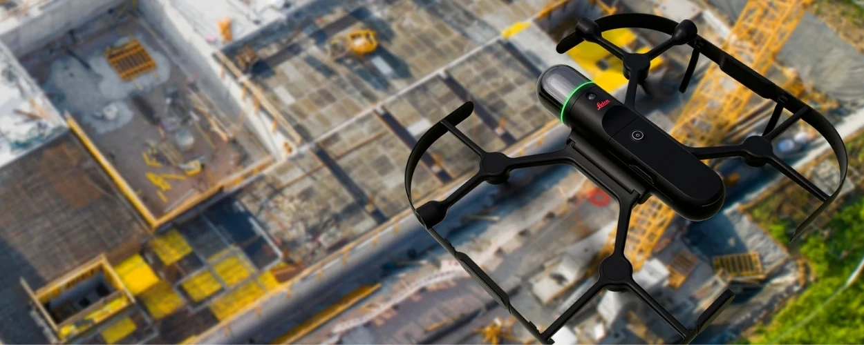 Leica BLK2FLY Autonomous Aerial Laser Scanning for Construction Sites Leica BLK2FLY autonomous flying laser scanner capturing exterior construction site data for 3D reality capture and project documentation