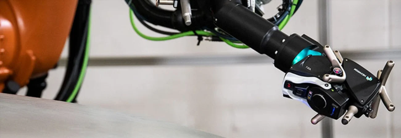 Hexagon Absolute Scanner AS1 mounted on an industrial robot for automated 3D inspection