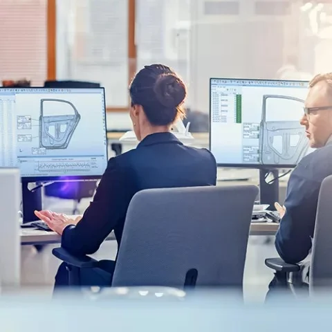 PolyWorks Inspector Dimensional Inspection Results Review Quality engineers reviewing dimensional inspection results in PolyWorks Inspector