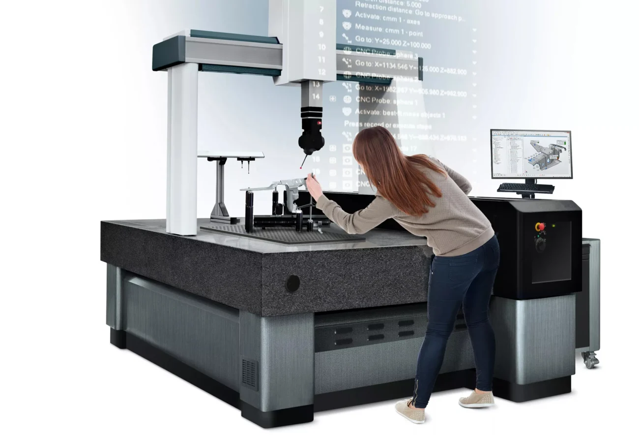 PolyWorks Inspector CNC CMM Inspection Software Operator using PolyWorks Inspector software to inspect a component on a CNC CMM