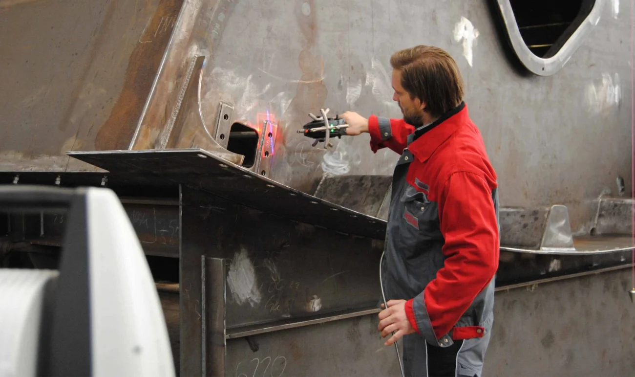 Leica AT960 robotic inspection and automated 3D measurement of an automotive body