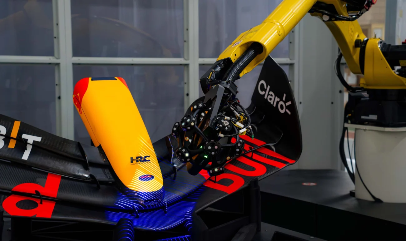 Robot-mounted 3D scanner inspecting a Formula racing car component