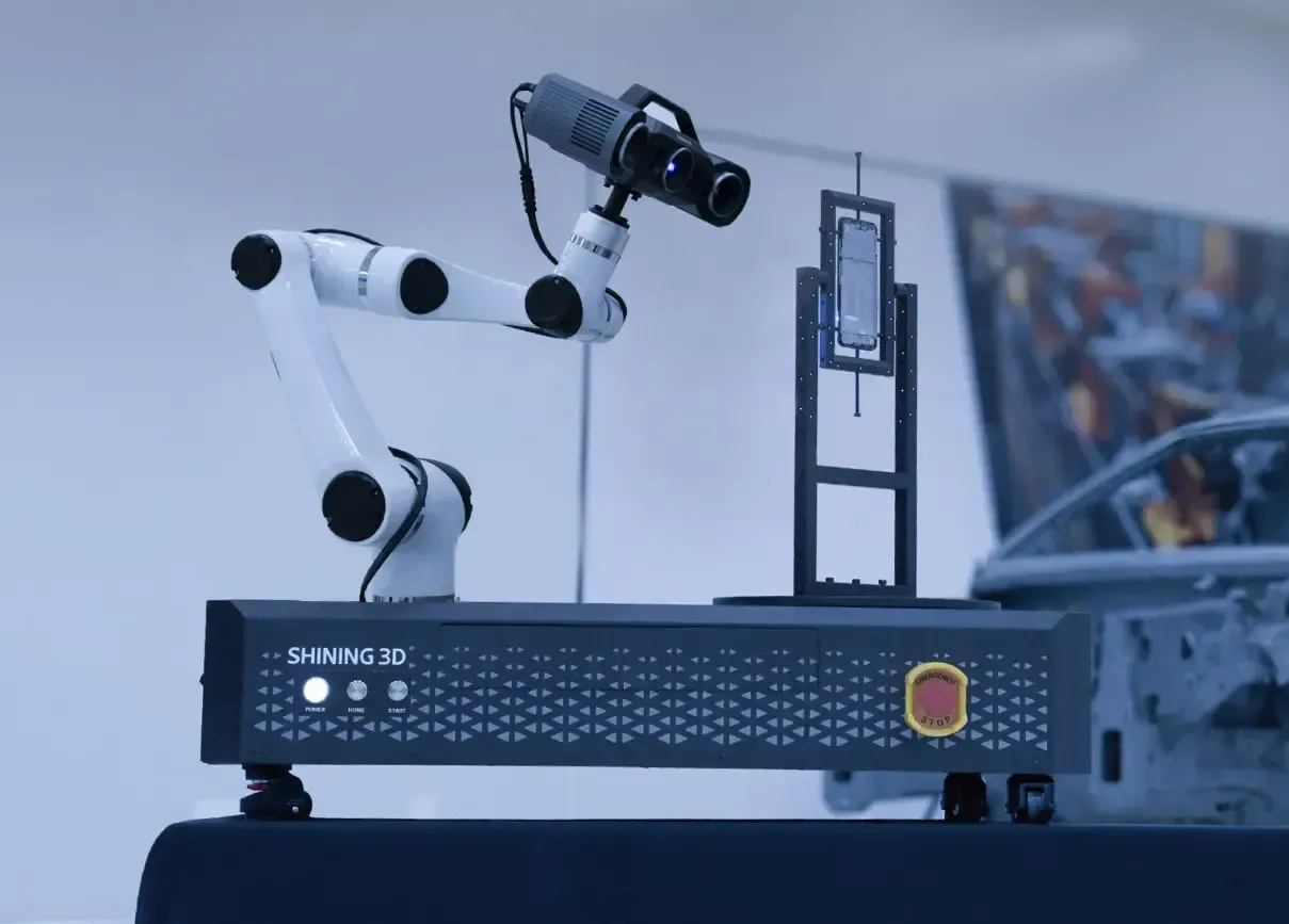 OptimScan Q12/Q9 HD | Automated 3D Inspection Solution SHINING 3D OptimScan Q12/Q9 HD mounted on an industrial robotic arm for automated 3D measurement and dimensional inspection.
