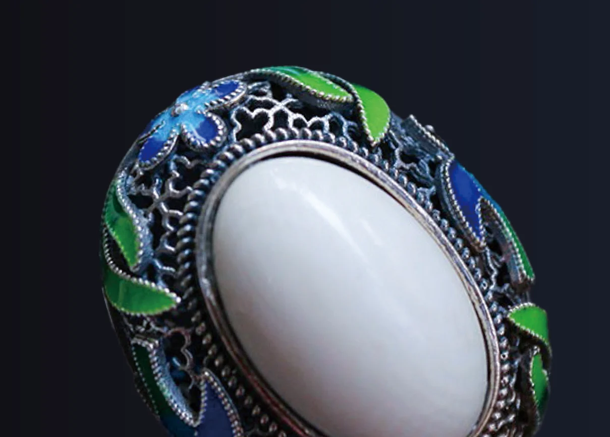 AutoScan Inspec2 Full-Color 3D Scanning for Jewelry Detailed full-color 3D scan of an ornate ring featuring a white gemstone, blue and green decorative elements, and intricate metalwork.