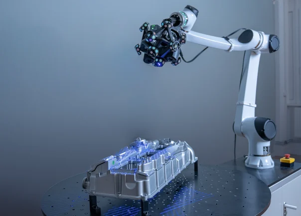 SHINING 3D RobotScan Trak Nova Customized Automated 3D Scanning Solution RobotScan Trak Nova customized robotic 3D scanning system measuring a large industrial metal component on a turntable.