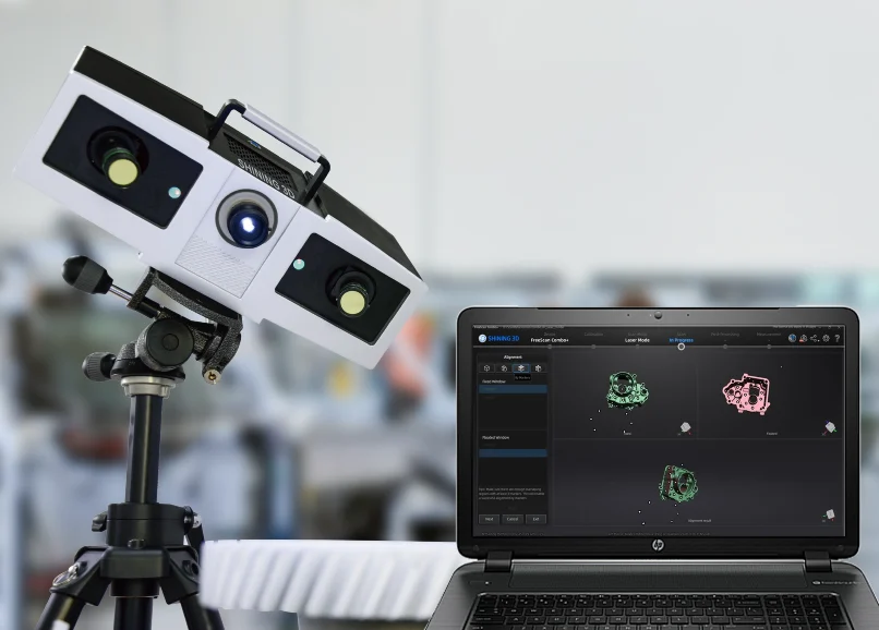 OptimScan 5M Plus Automatic 3D Scan Alignment SHINING 3D OptimScan 5M Plus mounted on a tripod beside a laptop displaying 3D scan alignment results.